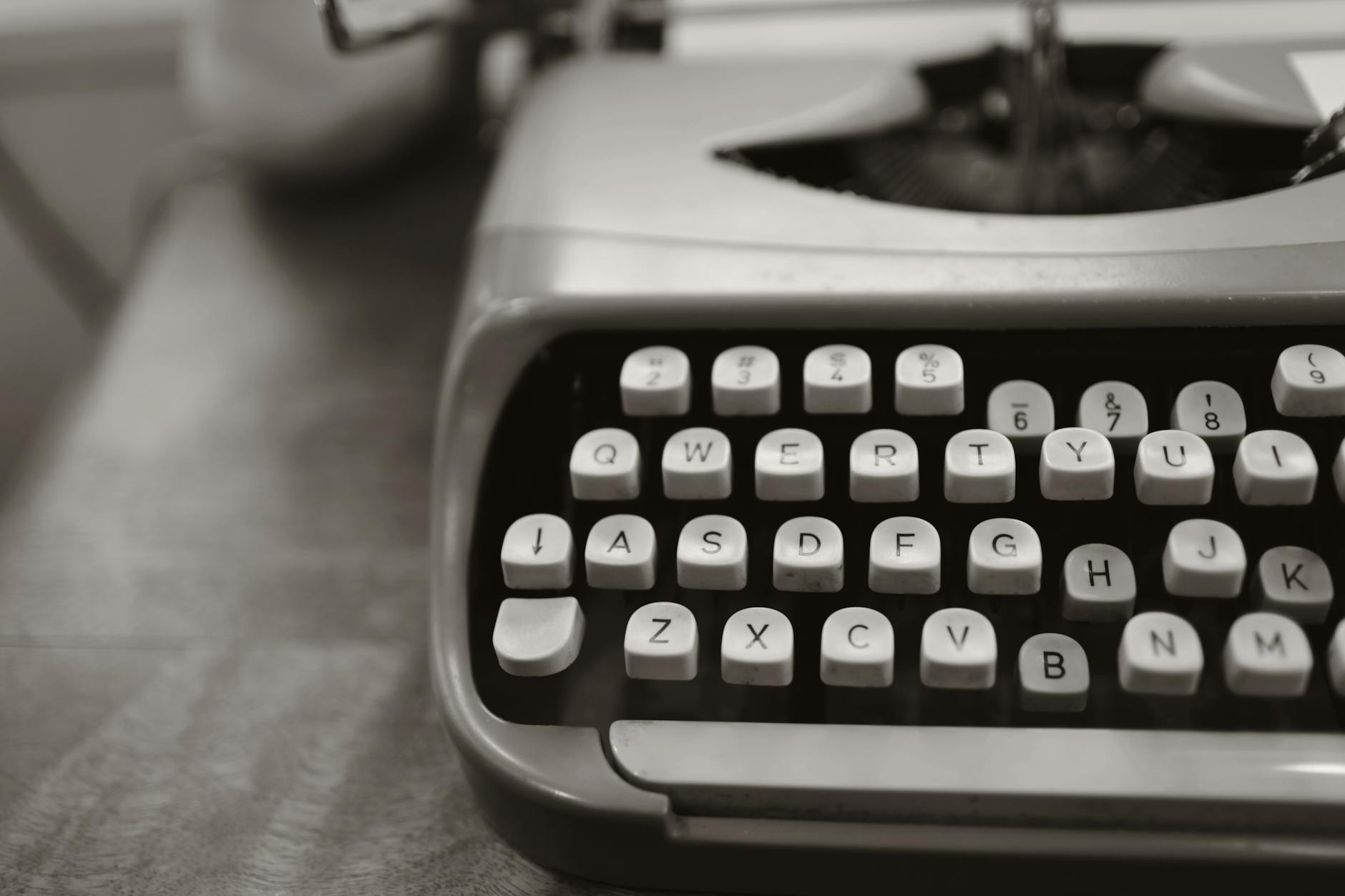 close up photo of gray typewriter